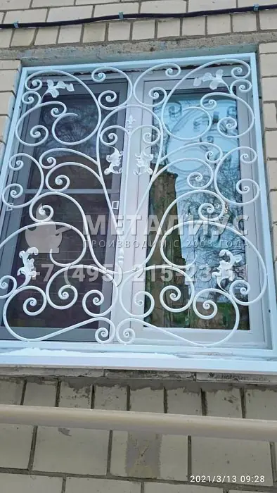 Работа 705  Яркие кованные решетки на окнах на ул.Щукинская